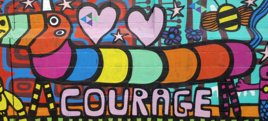 mural with colorful animals and the word "courage"