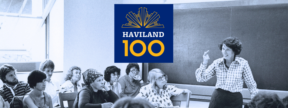 A teacher instructs a class of students in Haviland Hall; Haviland 100: Berkeley Social Welfare logo is overlaid