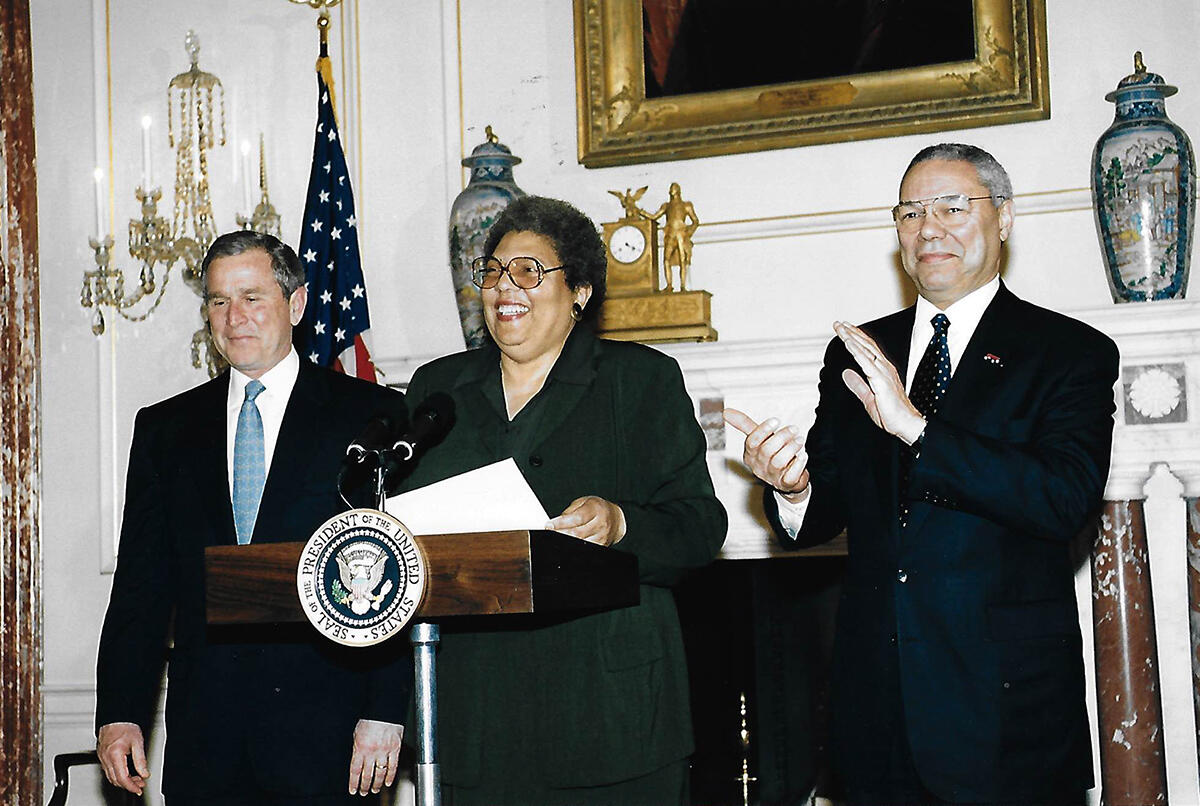 Ambassador Ruth A. Davis with President George W. Bush and Secretary of State Colin Powell in 2001