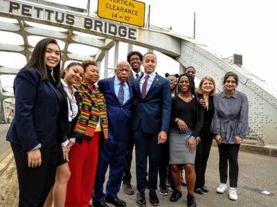 John Lewis with Barbara Lee and young activists on the Edmond Pettus Bridge